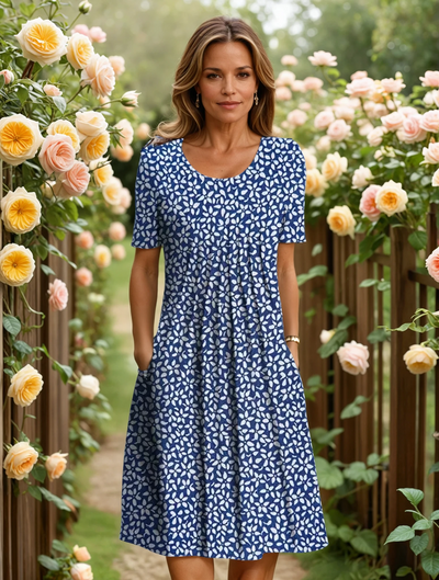 Kirsten – Sommerkjole med blomster, der bringer minder frem